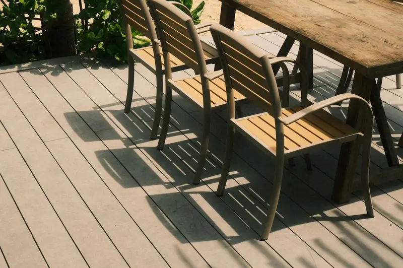 Newly built timber decking with garden furniture on a summer evening