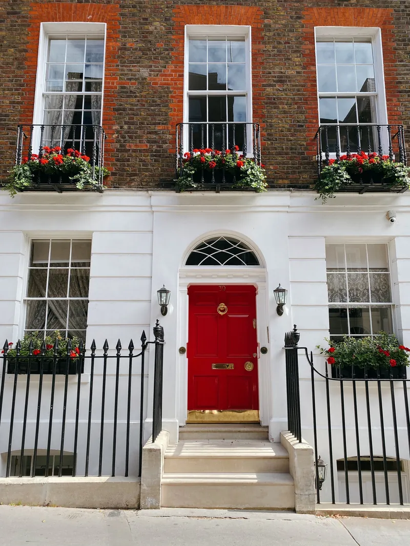 Georgian sash windows on a traditional brick townhouse